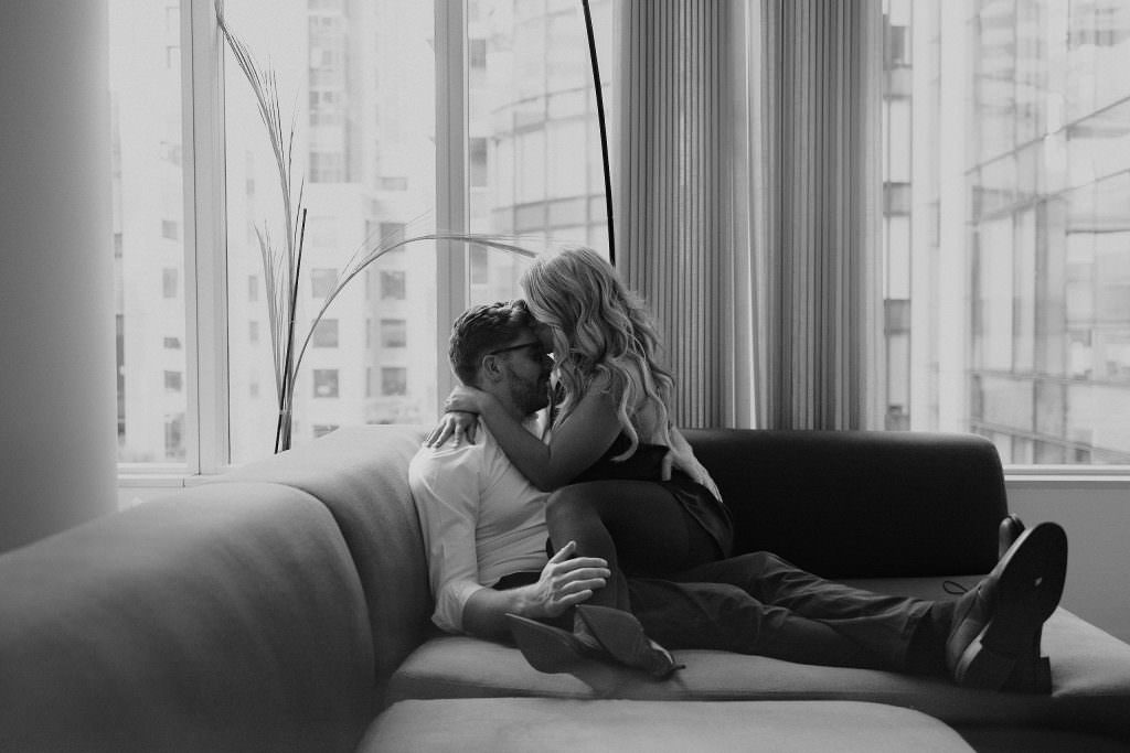 Modern Black & White Engagement Photo in San Francisco Apartment - Natural Light, Intimate Setting.