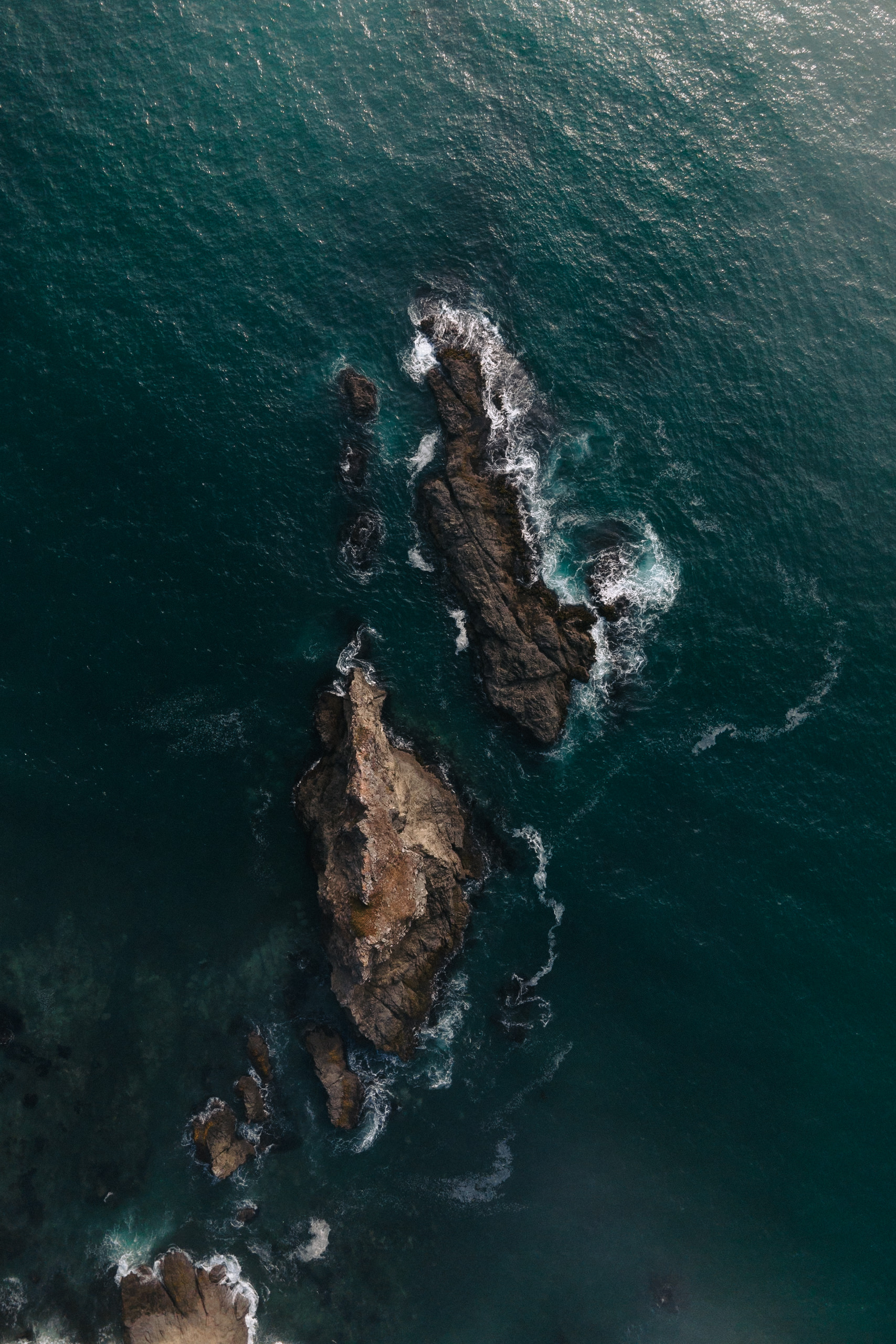 Aerial Photography: Dramatic Rocky Formations & Ocean Waves, Cuffey Cove, Northern California.