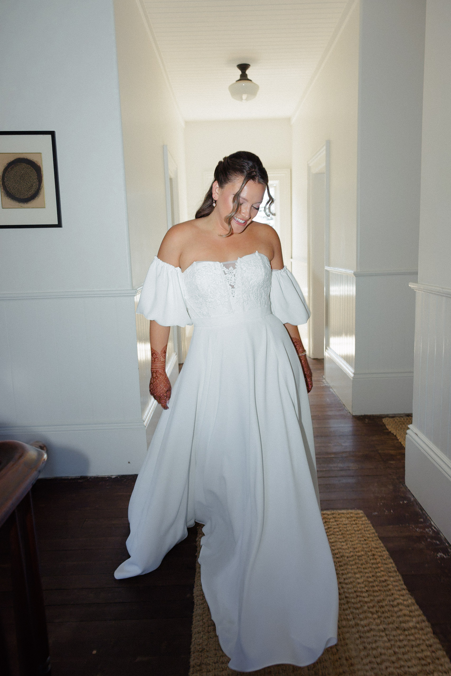 Elegant bride in white dress with henna, Cuffey Cove hallway, Northern California wedding photography.