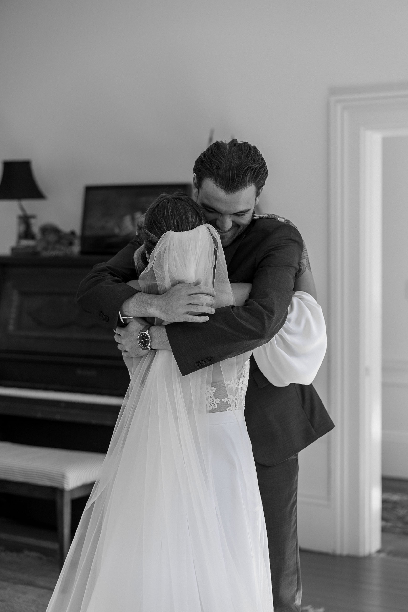 Northern California Wedding Photography: Intimate black-and-white moment at Cuffey Cove. Elegant bride & groom embrace.