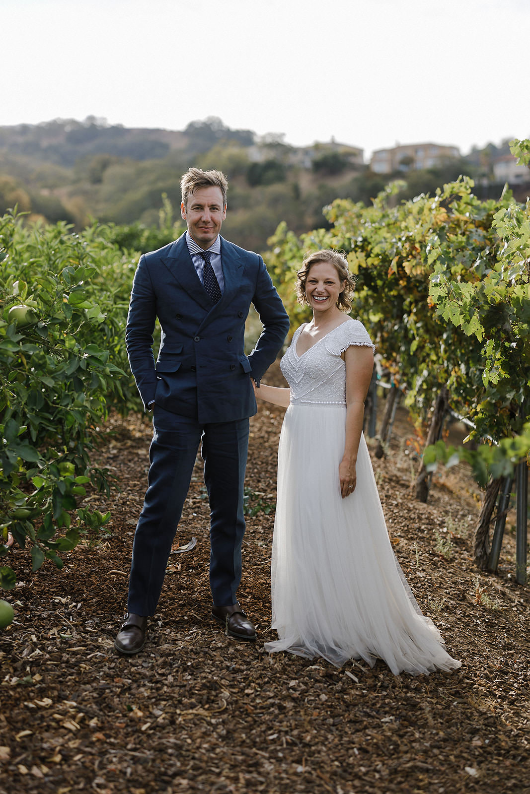 Elegant Wedding Photography: Bride and Groom in Scenic San Jose Vineyard.