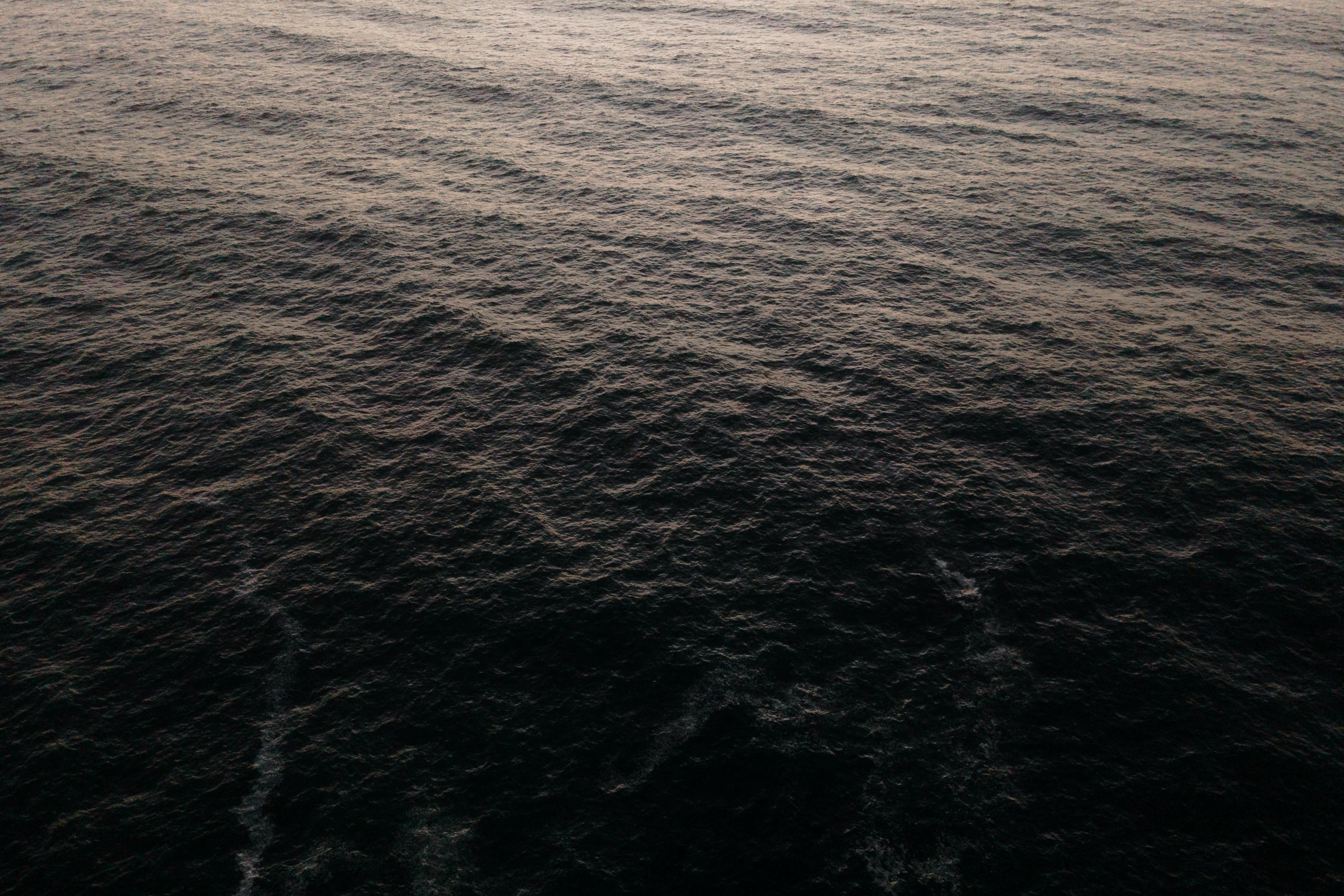 Aerial Photography: Serene Mendocino Seascape with Sunlit Waves.