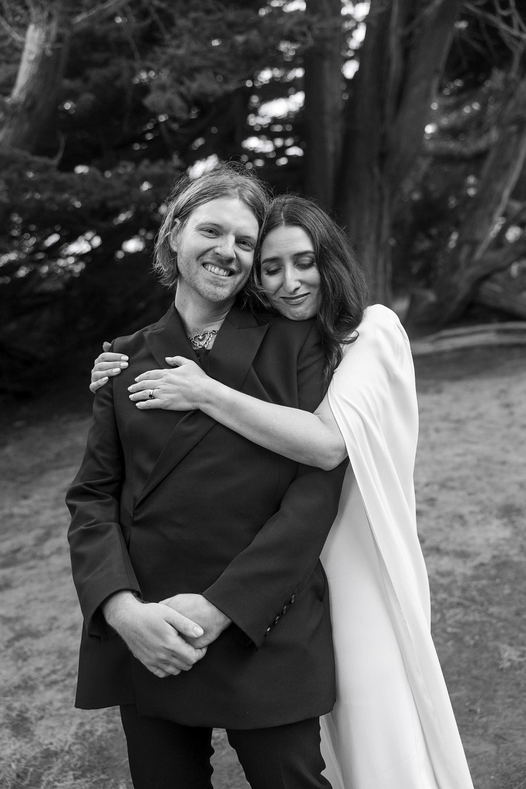 Elegant Mendocino Wedding: Couples Joy Under Towering Trees, Timeless Black & White Photography.