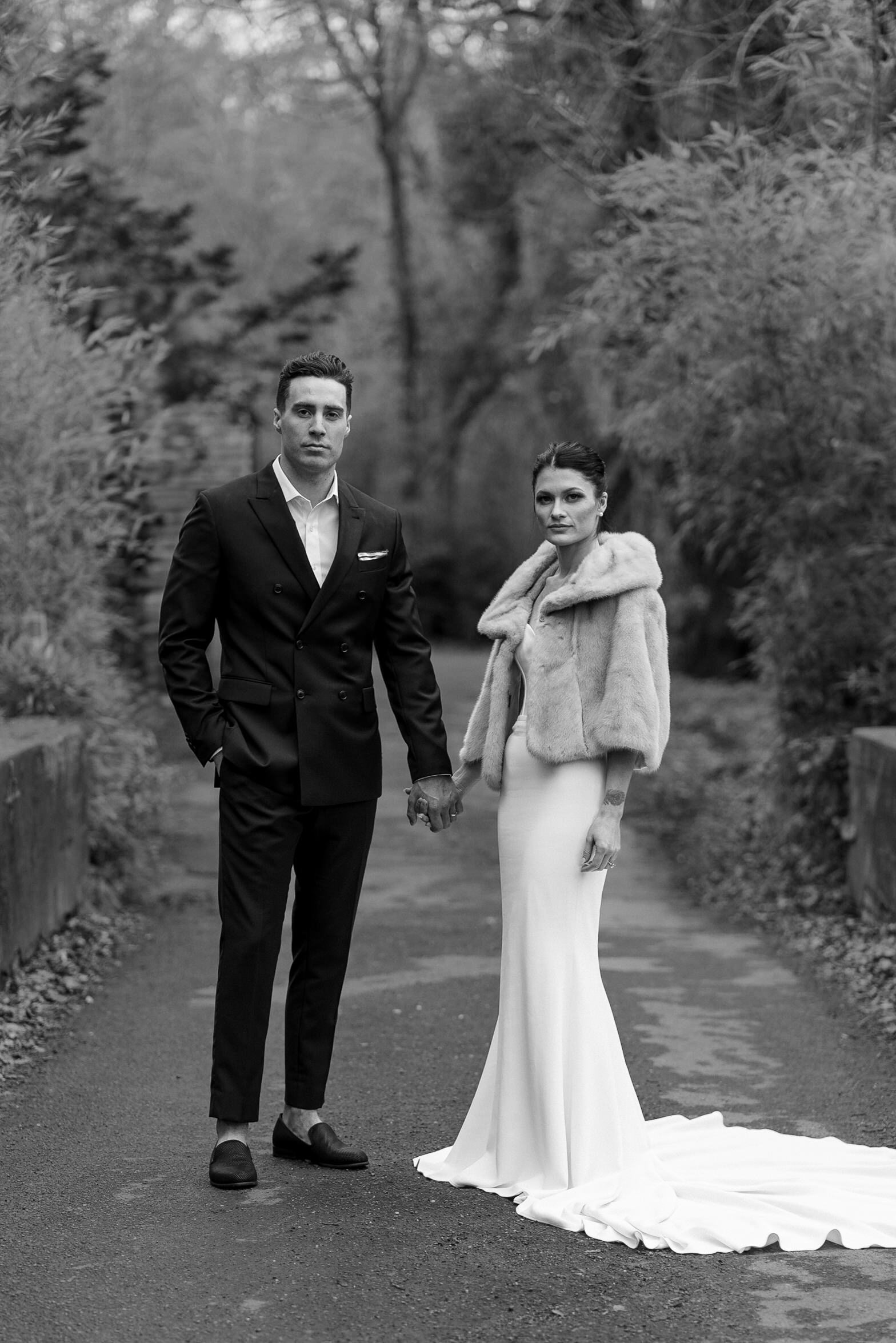 Elegant Couples Portrait in Serene Forest Setting | Black & White Wedding Photography.