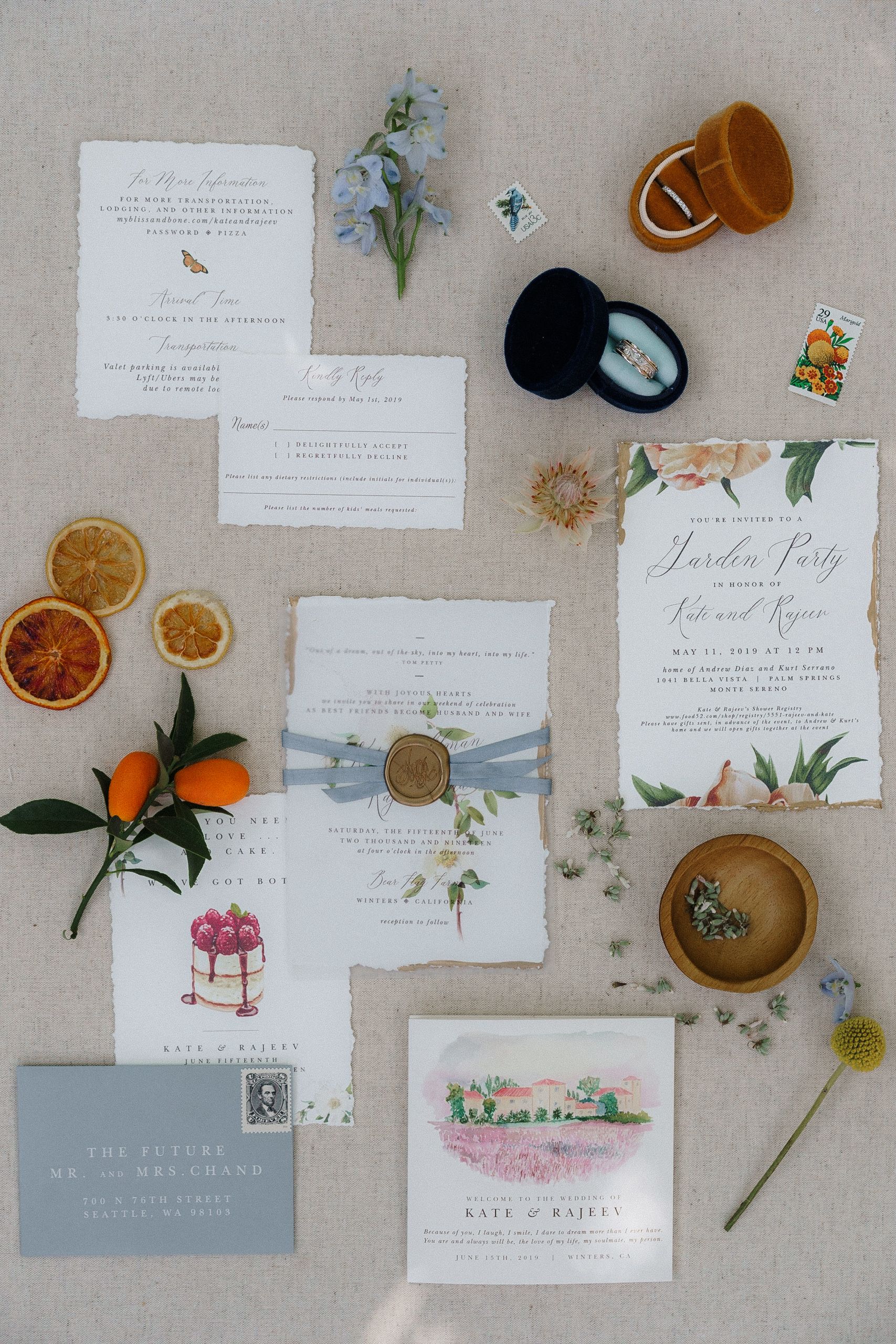 Bear Flag Farm Wedding Invitation Suite: Elegant flat lay with floral accents and vintage details.